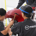 子どもたちが「当て板」で鈑金体験！ “本物”の道具や車両でチャレンジする姿にプロたちも熱視線…未来のクルマ社会を支える人材育成と、現場のプロの誇りを伝える二日間【ジュニアメカニック2026＠福岡】