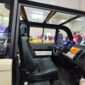 KGモーターズ ミニマルモビリティコンセプト（東京オートサロン2023）。ドアを開けて運転席を見る