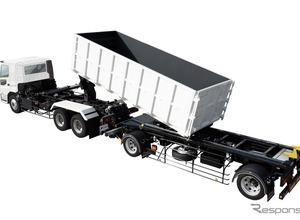 狭小現場での作業性を大幅に向上させた「脱着ボデー車」登場…コンテナ着脱作業スペースを60％削減…前吊り式フックロールフルトレーラ…極東開発工業 画像