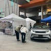 BYDの試乗車は新型の「SEALION 7」、展示車両はドルフィン。価格的にはINSTERとの競合になる。